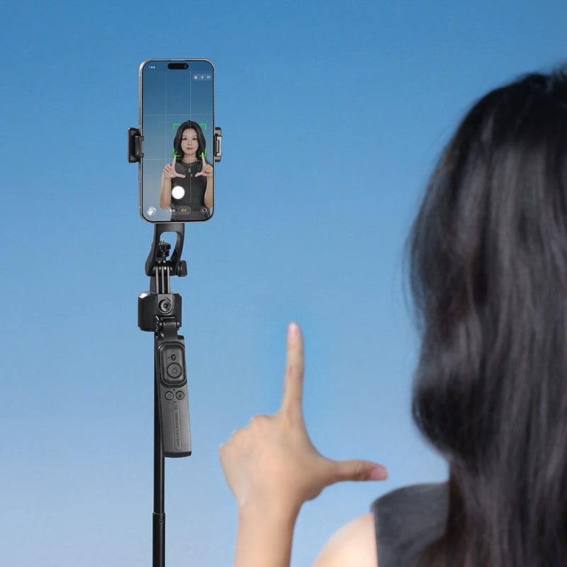 Tracking selfie stick with tripod for smartphones, ideal for vlogging and content creation. Features intelligent tracking, adjustable height, and stable tripod design for hands-free recording.